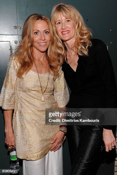 Musician Sheryl Crow and actress Laura Dern pose backstage during the David Lynch Foundation "Change Begins Within" concert at Radio City Music Hall...