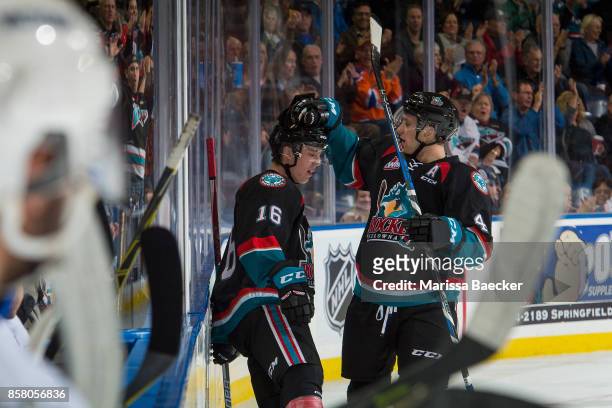 Kole Lind is congratulated by Gordie Ballhorn of the Kelowna Rockets on a first period goal against the Victoria Royals at Prospera Place on October...
