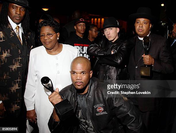 Connie Perry, mother of deceased Jason "Jam Master Jay" Mizell, Darryl "D.M.C." McDaniels, Eminem and Joseph "Rev. Run" Simmons attend the 24th...