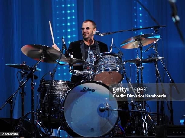 Musician Ringo Starr performs onstage at the David Lynch Foundation "Change Begins Within" show at Radio City Music Hall on April 4, 2009 in New York...