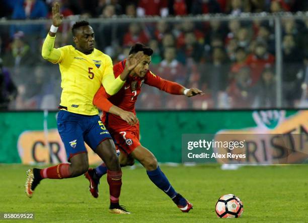 Alexis Sanchez of Chile fights for the ball with Renato Ibarra of Ecuador during a match between Chile and Ecuador as part of FIFA 2018 World Cup...