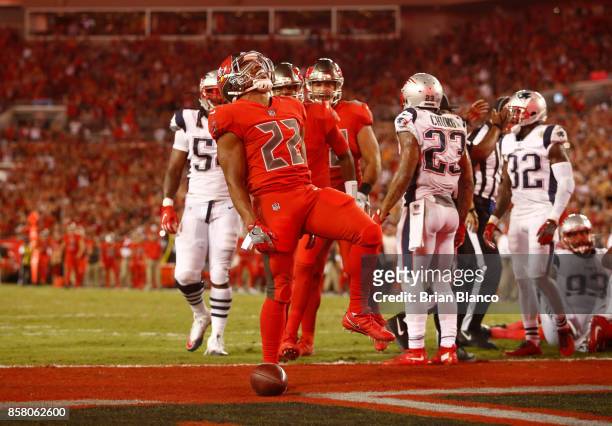 Running back Doug Martin of the Tampa Bay Buccaneers celebrates in the end zone following a 1-yard rush for a touchdown during the second quarter of...