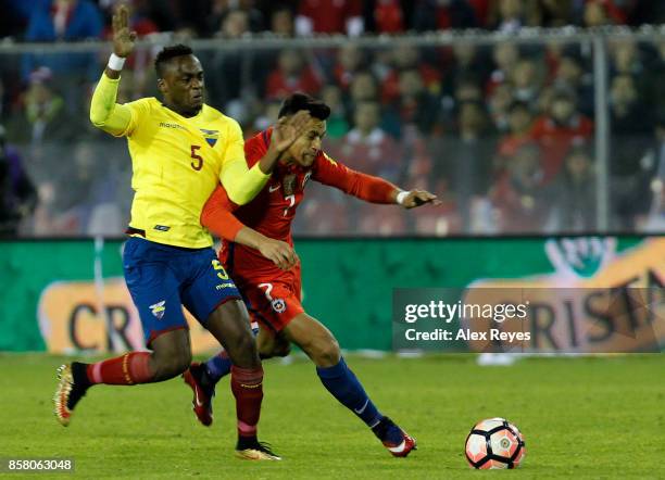 Alexis Sanchez of Chile fights for the ball with Renato Ibarra of Ecuador during a match between Chile and Ecuador as part of FIFA 2018 World Cup...