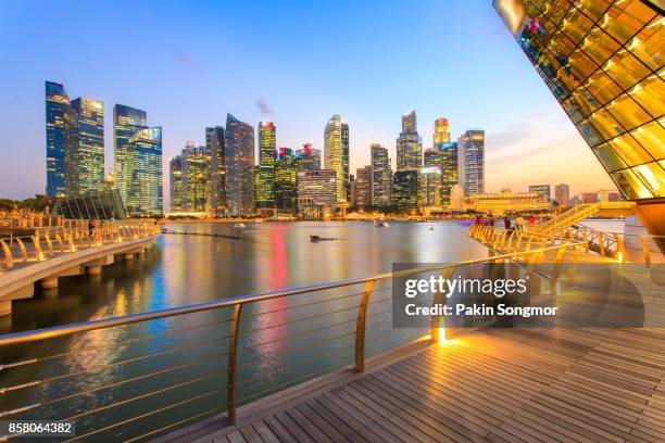 colorful lights architecture business building and financial district in sunset time at singapore city. - シンガポール川 ストックフォトと画像