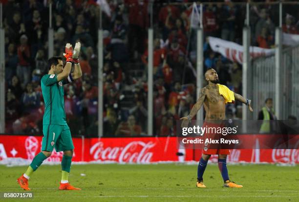 Claudio Bravo goalkeeper of Chile and teammate Arturoo Vidal celebrate after a match between Chile and Ecuador as part of FIFA 2018 World Cup...