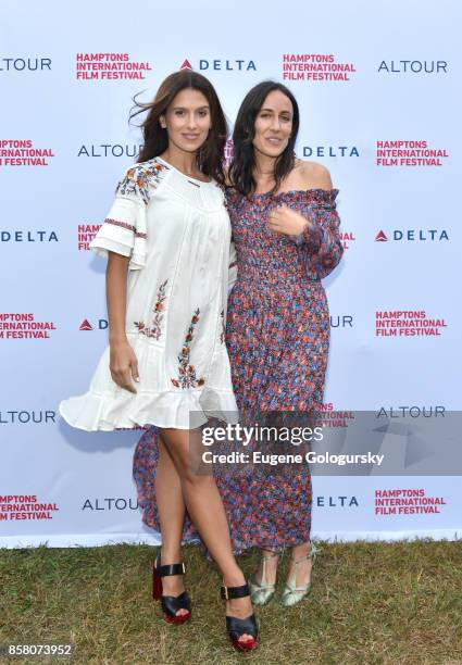 Hilaria Baldwin and Violet Gaynor attend the Pre Opening Toast Poster Exhibition during Hamptons International Film Festival 2017 - Day One at...