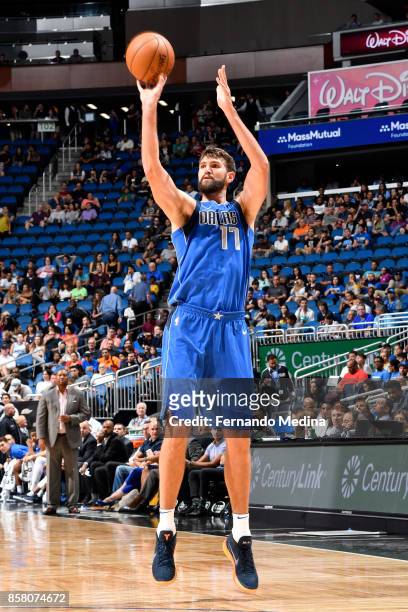 Jeff Withey of the Dallas Mavericks shoots the ball against the Orlando Magic during a preseason game on October 5, 2017 at Amway Center in Orlando,...