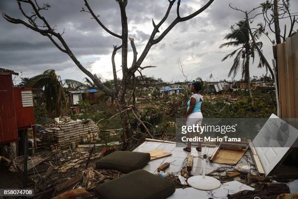 Resident Mirian Medina stands on her property about two weeks after Hurricane Maria swept through the island on October 5, 2017 in San Isidro, Puerto...