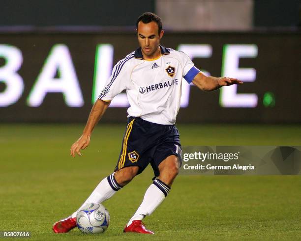 Forward Landon Donovan of the Los Angeles Galaxy in action against the defensive line of the Colorado Rapids during their MLS game at The Home Depot...