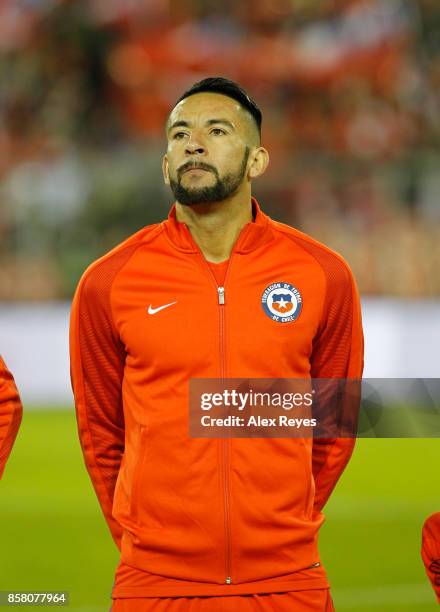 Mauricio Isla of Chile looks on during the national anthem prior a match between Chile and Ecuador as part of FIFA 2018 World Cup Qualifiers at...