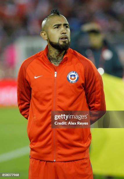 Arturo Vidal of Chile looks on during the national anthem prior a match between Chile and Ecuador as part of FIFA 2018 World Cup Qualifiers at...