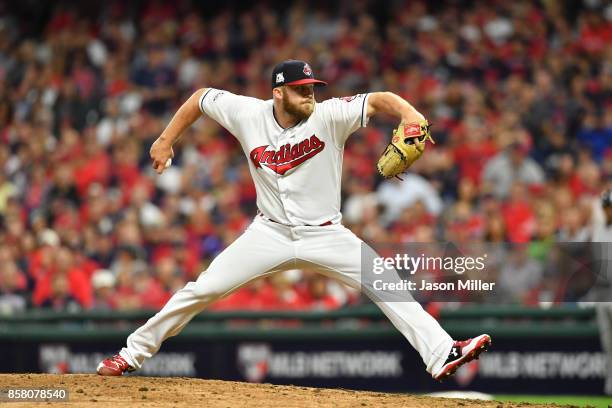 Cody Allen of the Cleveland Indians delivers the pitch during the eighth inning against the New York Yankees during game one of the American League...