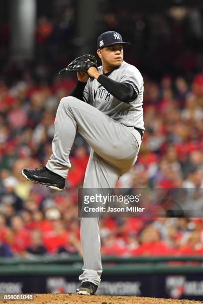 Dellin Betances of the New York Yankees delivers the pitch during the eighth inning against the Cleveland Indians during game one of the American...