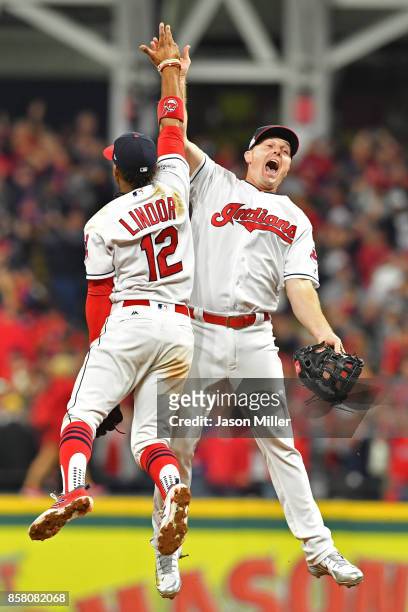 Francisco Lindor and Jay Bruce of the Cleveland Indians celebrate their teams victory over the New York Yankees after game one of the American League...