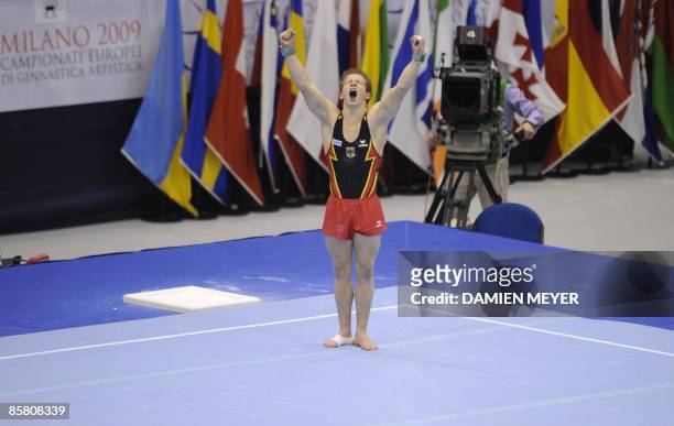 Germany's Fabian Hambuechen celebrates at the end of his floor exercise during the Apparatus finals of the Third European Men's Artistic...