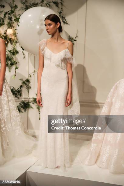 Model poses during the Monique Lhuillier Spring 2018 Bridal Presentation at the Academy Mansion on October 5, 2017 in New York City.