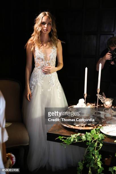 Model poses during the Monique Lhuillier Spring 2018 Bridal Presentation at the Academy Mansion on October 5, 2017 in New York City.