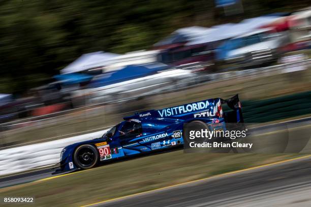The Ligier LMP2 of Marc Goosens, of Belgium, Renger van der Zande, of the Netherlands, and Jonothan Bomarito races on the track during practice at...