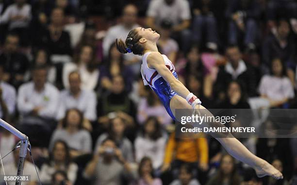 France's Youna Dufournet performs on uneven bars to take the fourth place during the Apparatus final of the Third European Women's Artistic...