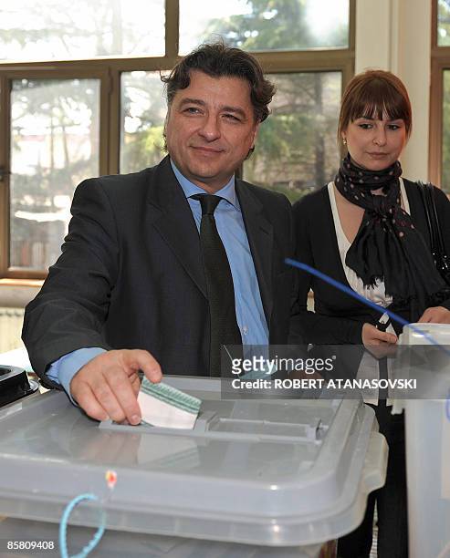Ljubomir Frckovski, presidential candidate of the main opposition and centre-left Social Democratic Union of Macedonia party casts his vote as his...