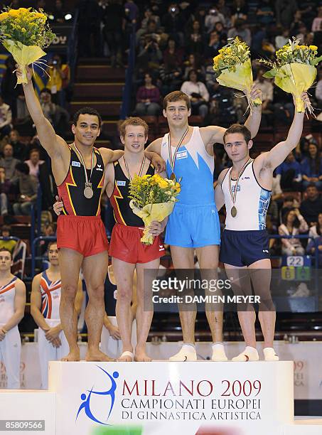 Gold medalist Germany's Fabian Hambuechen , silver medalist Germany's Matthias Fahrig and bronze medalists Israel's Alexander Shatilov and Greece's...