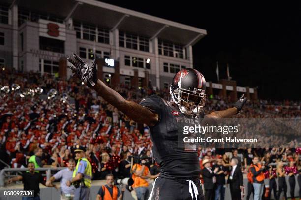 Mike Stevens of the North Carolina State Wolfpack reacts after breaking up a pass against the Louisville Cardinals during the game at Carter Finley...