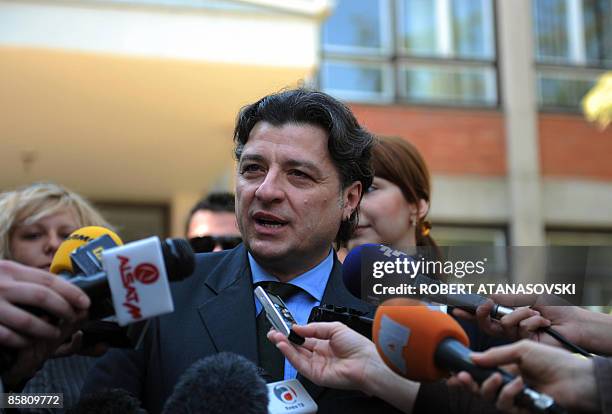 Presidential candidate of the main opposition and centre-left Social Democratic Union of Macedonia Ljubomir Frckovski talks to journalists after...