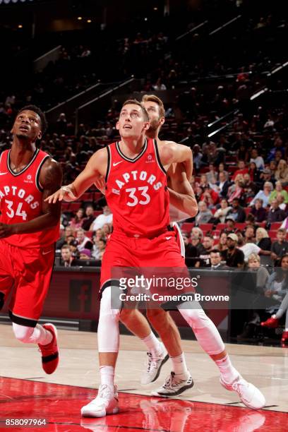 Kyle Wiltjer of the Toronto Raptors boxes out the Portland Trail Blazers during the preseason game on October 5, 2017 at the Moda Center in Portland,...