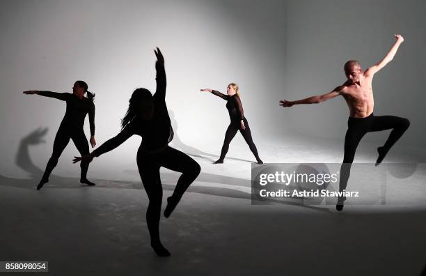 Dancers perform during the Brad Walsh "Antiglot" performance and album release party at Pier 59 Studios on October 5, 2017 in New York City.