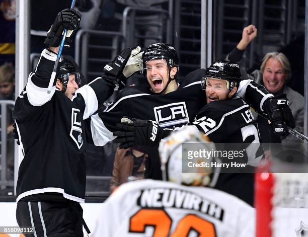 Trevor Lewis celebrates his goal with Kurtis MacDermid and Kyle Clifford iin front of Michal Neuvirth of the Philadelphia Flyers to take a 1-0 lead...