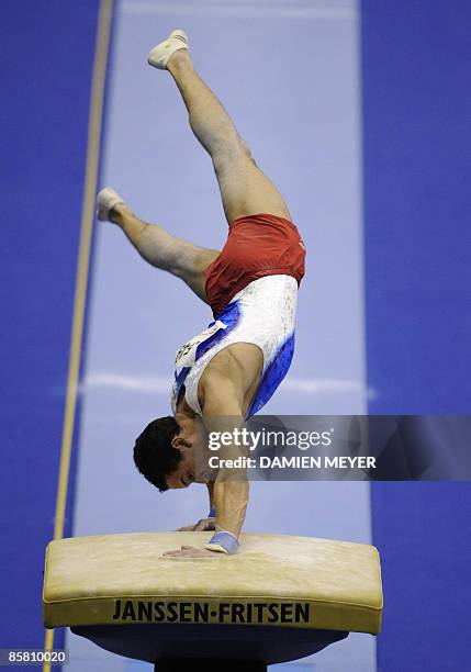 France's Thomas Bouhail performs on vault to win gold during the Apparatus finals of the Third European Men's Artistic Championships on April 5, 2009...