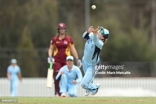 Alex Blackwell of NSW dives for a catch during the WNCL match between New South Wales and Queensland at Blacktown International Sportspark on October...