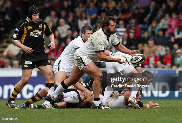 Carl Hayman of Newcastle passes the ball during the Guinness Premiership match between London Wasps and Newcastle Falcons at Adams Park on April 5,...