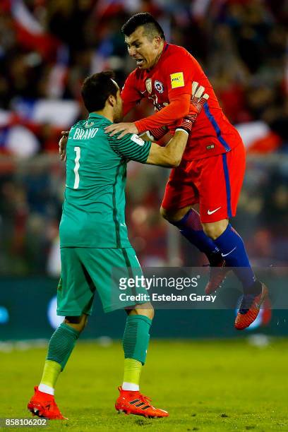 Claudio Bravo goalkeeper and Gary Medel of Chile celebrate after a match between Chile and Ecuador as part of FIFA 2018 World Cup Qualifiers at...