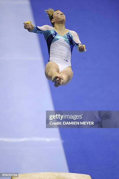 Switzerland's Ariella Kaeslin performs on vault to win gold in the Apparatus competition of the Third European Women's Artistic Championships on...