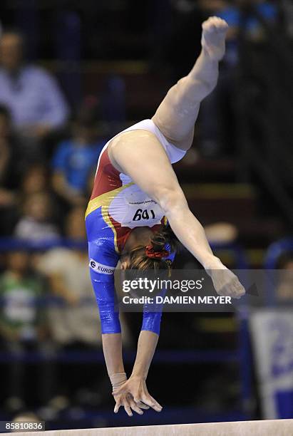 Romania's Gabriela Dragoi performs on beam to win bronze during the Apparatus final of the Third European Women's Artistic Championships on April 5,...