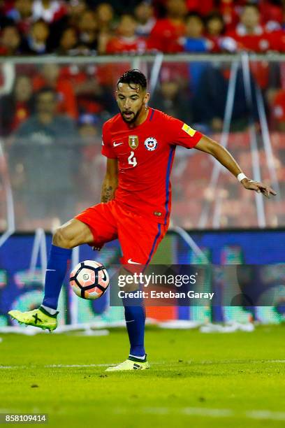 Mauricio Isla of Chile drives the ball during a match between Chile and Ecuador as part of FIFA 2018 World Cup Qualifiers at Monumental Stadium on...