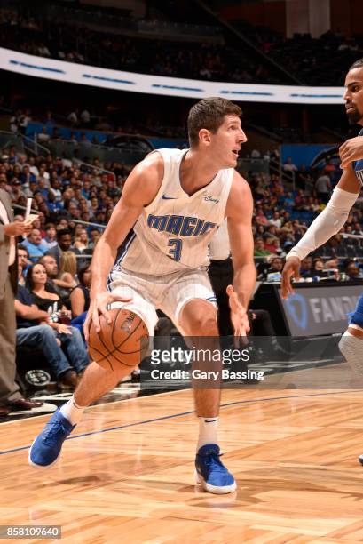 Damjan Rudez of the Orlando Magic handles the ball against the Dallas Mavericks during a preseason game on October 5, 2017 at Amway Center in...