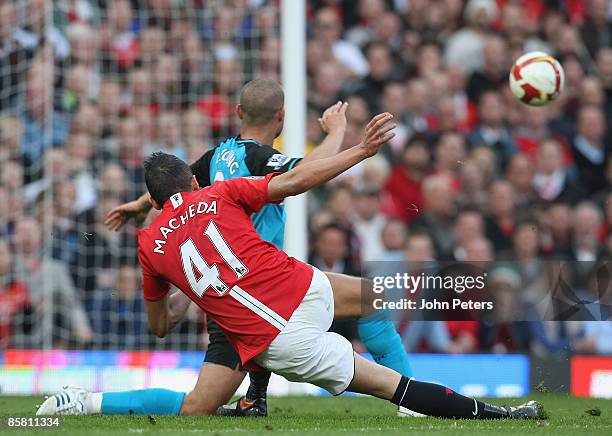 Federico Macheda of Manchester United scores their third goal during the Barclays Premier League match between Manchester United and Aston Villa at...