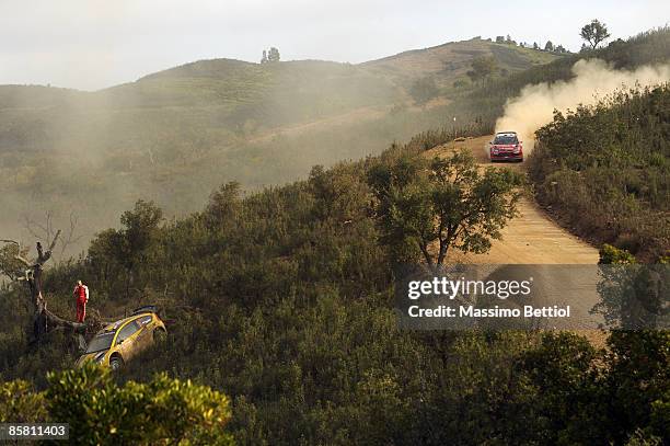 Evgeny Novikov of Russia and Dale Moscatt of Australia after they crashed their Citroen C4 during Leg 3 of the WRC Vodafone Rally Portugal on April...