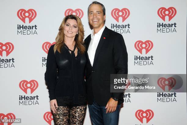 Singer Shania Twain and Tim Castelli, President of National Sales, Marketing and Partnerships for iHeartMedia pose at a dinner party hosted by...