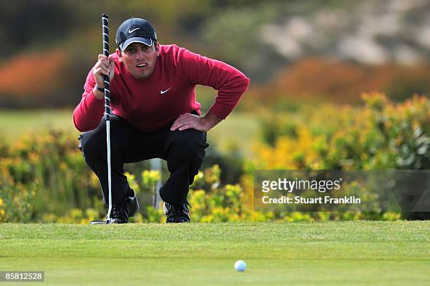 Francesco Molinari of Italy lines up his putt on the 16th hole during the final round of The Estoril Open de Portugal The Oitavos Dunes Golf Course...
