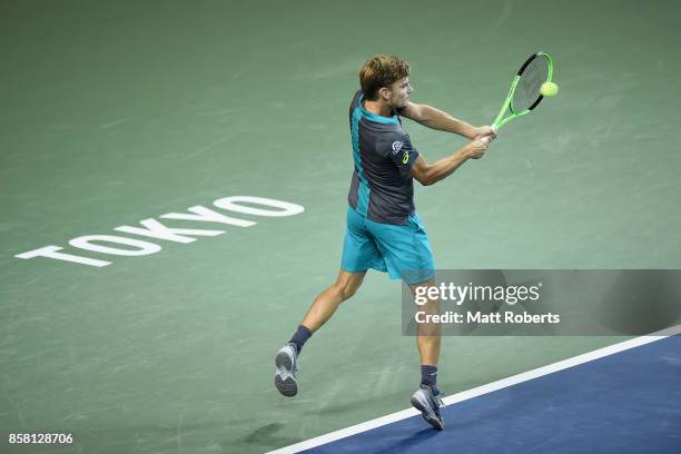 David Goffin of Belgium plays a backhand in his quarterfinal match against Richard Gasquet of France during day five of the Rakuten Open at Ariake...