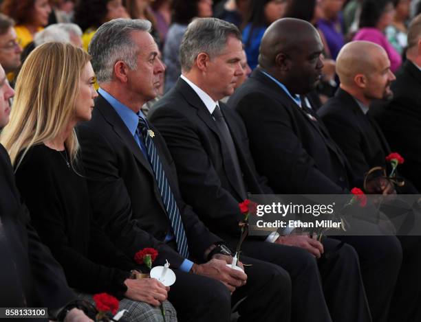 Clark County Sheriff Joe Lombardo and MGM Resorts International Chairman and CEO Jim Murren attend a vigil for Las Vegas Metropolitan Police...