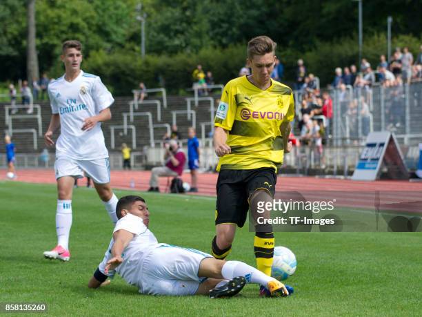 Gorka Zabarte Moreno of Real Madrid and Florian Rausch of Dortmund battle for the ball during the EMKA RUHR-Cup International Final match between...