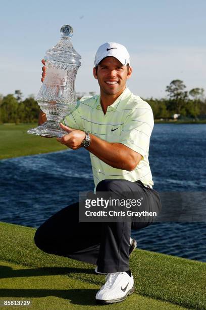 Paul Casey of the UK holds the winner's trophy after the final round of the Shell Houston Open on April 5, 2009 at Redstone Golf Club in Humble,...
