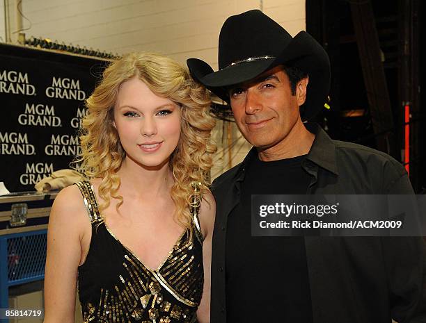 Singer Taylor Swift and magician David Copperfield pose backstage during the 44th annual Academy Of Country Music Awards held at the MGM Grand on...