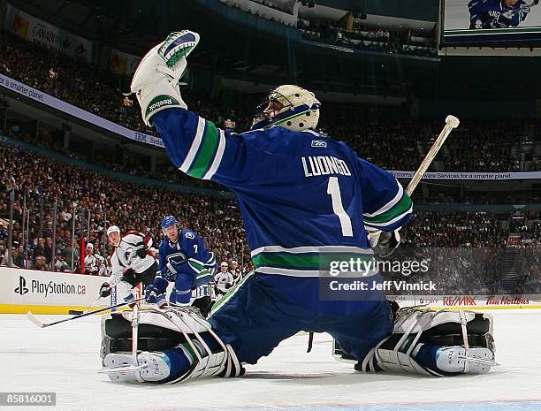 Roberto Luongo of the Vancouver Canucks makes a save off a Colorado Avalanche shot during their game at General Motors Place on April 5, 2009 in...