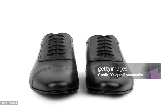 black leather male shoes, on white background - black lace background stock pictures, royalty-free photos & images