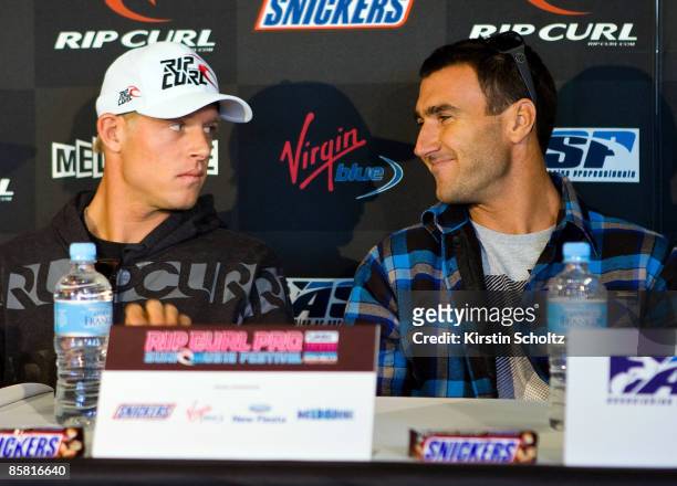 Mick Fanning of Australia and ASP World No. 1 Joel Parkinson of Australia look at each other during a press conference for the Rip Curl Pro presented...